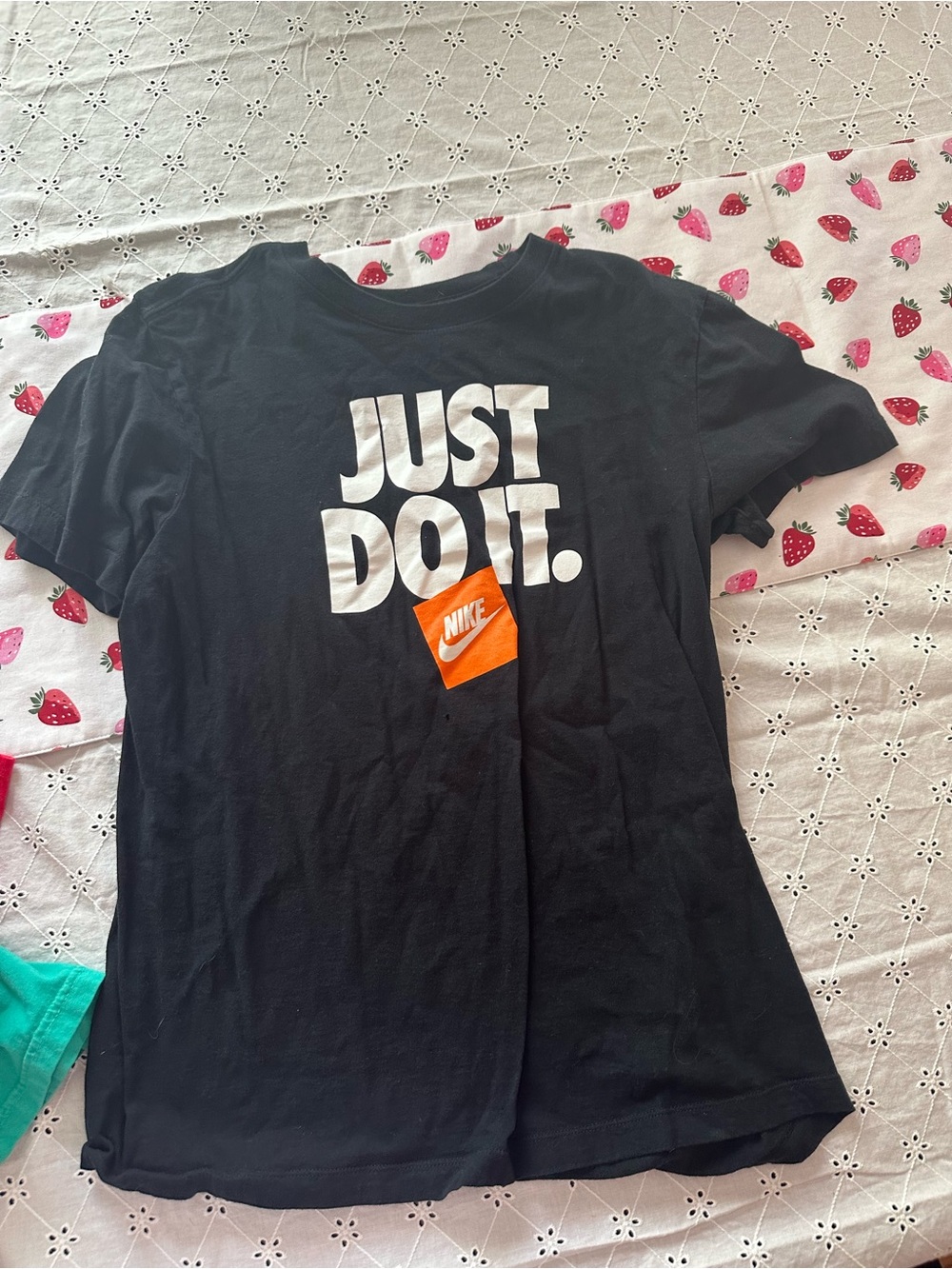 Nike Black Tee with White 'JUST DO IT.' and Orange Logo